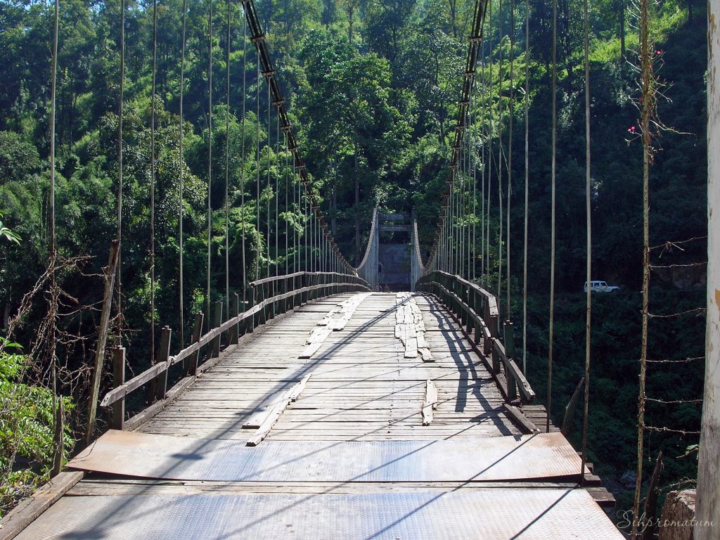 4-We-travelled-over-this-sketchy-bridge-in-a-fully-loaded-bus.-What-for-much-of-the-world-would-be-a-walkway-in-Nepal-this-is-an-operational-roadway.-1024x768