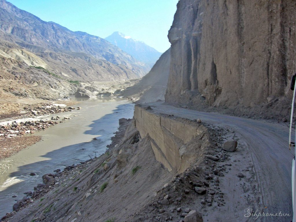 7-A-perilous-passage-while-the-roadway-cleaved-away-beneath-us-on-our-way-to-Karimabad-Pakistan.-1024x768