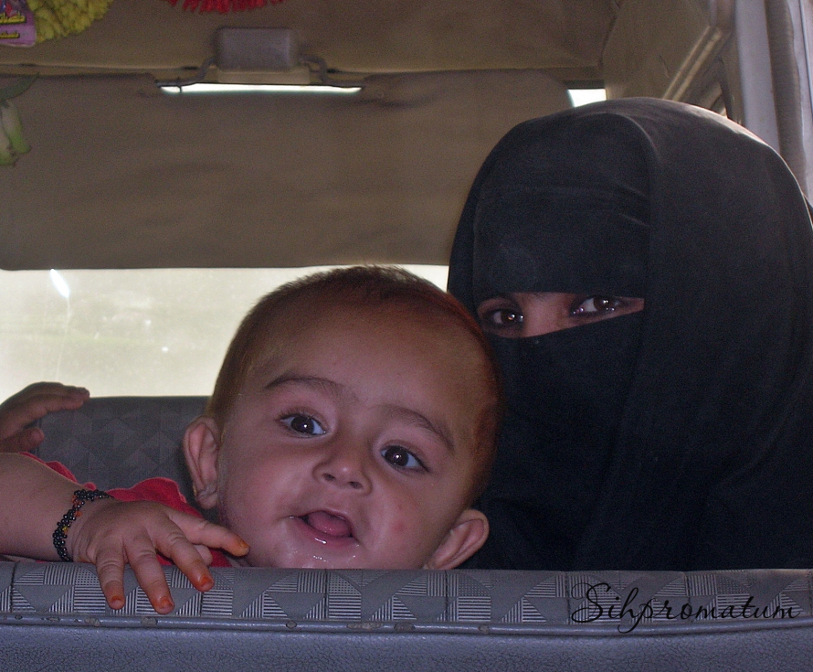 Curious-friendly-faces-on-a-local-bus-headed-to-Kabul-in-Afghanistan