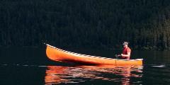 Serene-moment-in-a-sliver-of-orange-in-British-Columbia-Canada-the-only-sound-being-the-thrashing-of-a-fish-at-the-end-of-the-line.--800x400